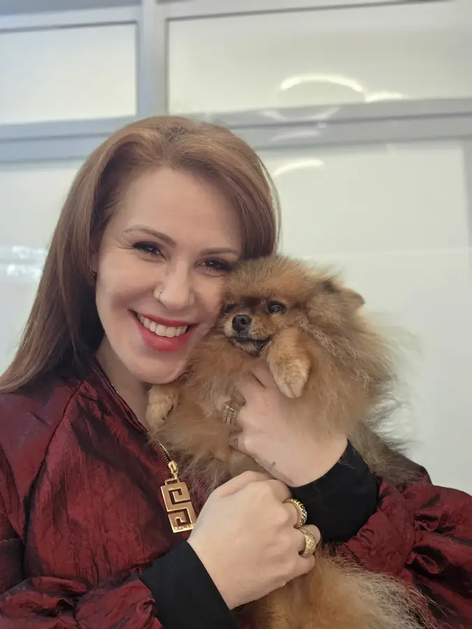 Dra. Clarice com um lulu da pomerânia